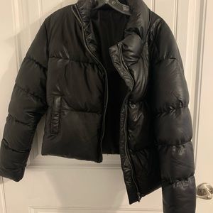 Black puffer jacket in size medium bought from boutique